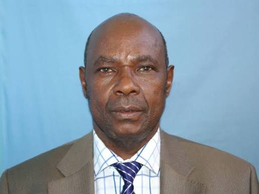 Portrait of John Dache Pesa